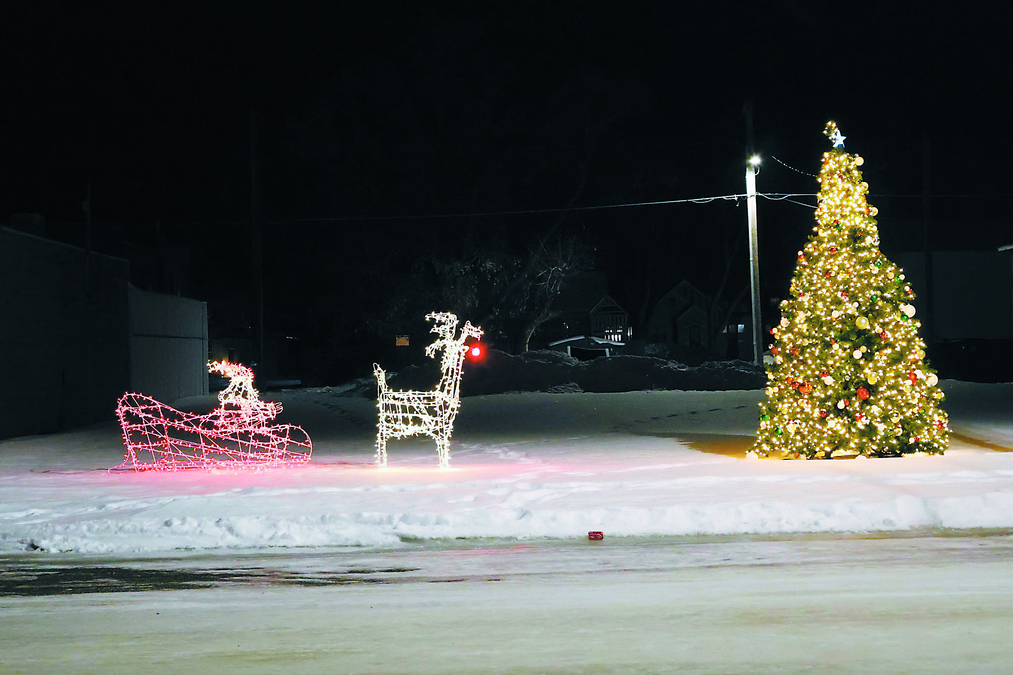 Santa with his sleigh and reindeer rehabbed by the North Border Shop Class. Photo by Rebecca Davis.