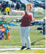 Brett Bryant competes in the discus at the meet in Larimore on May 9. Photo by Larry Stokke