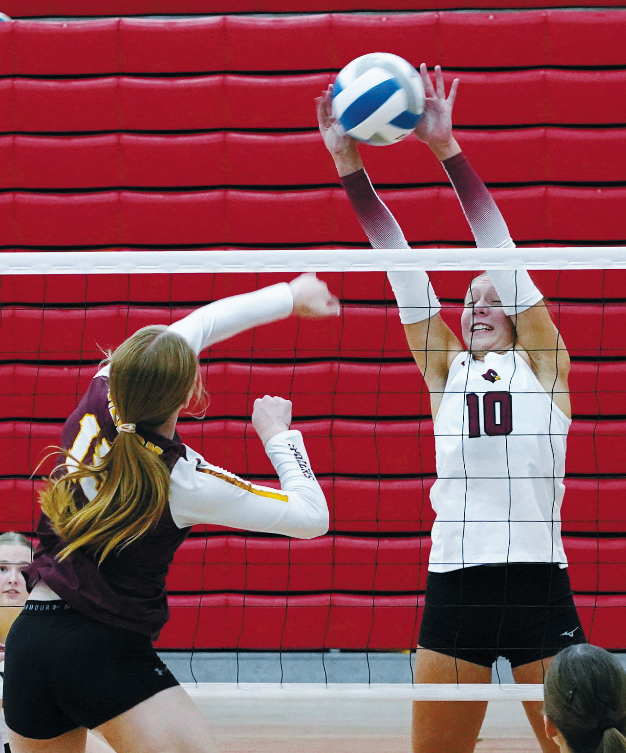 Aubrey Badding stuff blocks a Grafton Spoiler. Photo by Larry Stokke.