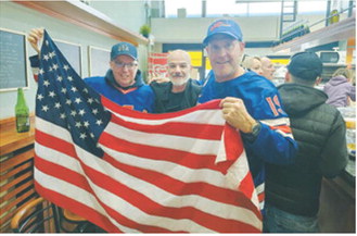 Fontaine celebrates the USA victory with friends in Milan, Italy. Submitted photo