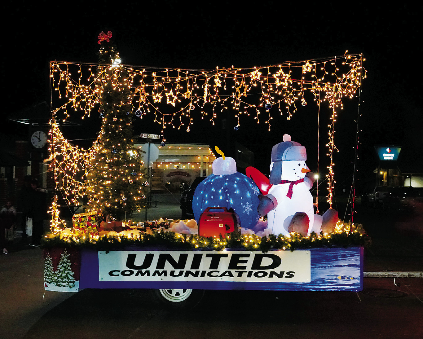 United Communications with their brightly lit float in the parade. Photo by Larry Stokke.