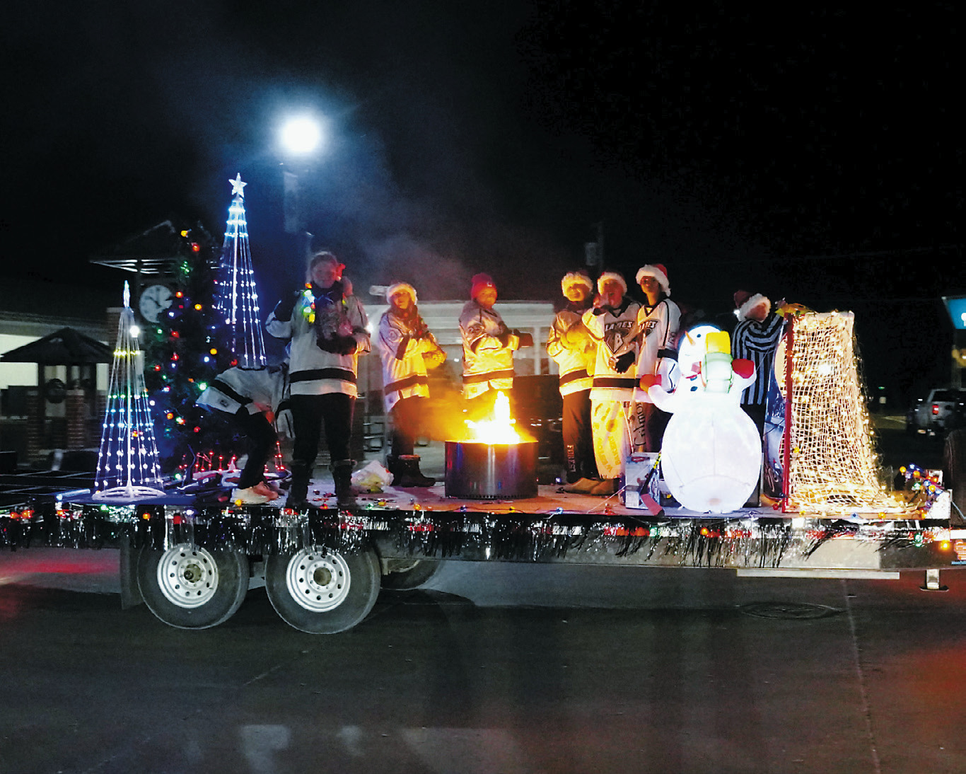 The 19U Girls Blades Hockey Team took home third place in Langdon's Parade of Lights. Photo by Larry Stokke.