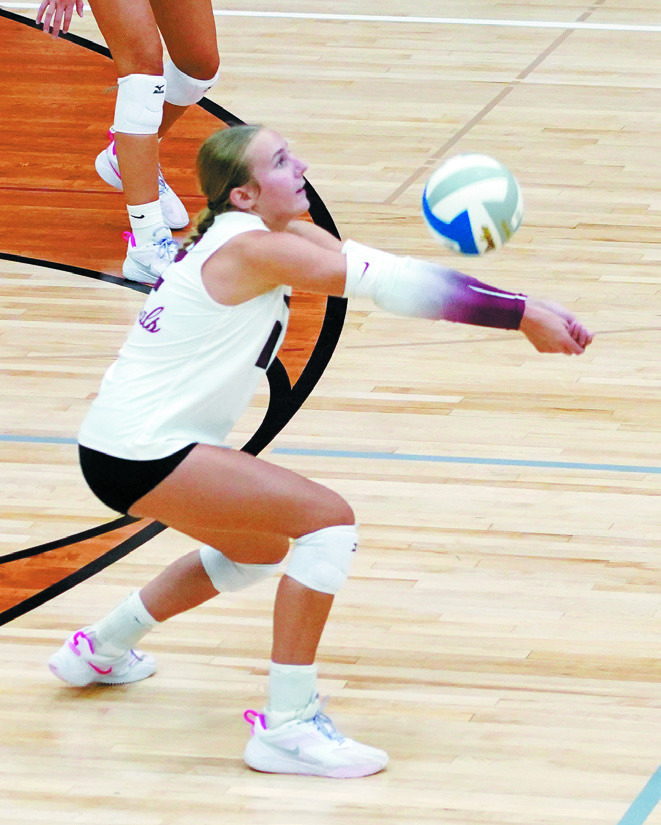 Kemi Morstad had 18 digs for the Cardinals in the game against the Cavalier Tornadoes on Sept. 5 in Langdon. Photo by Larry Stokke.