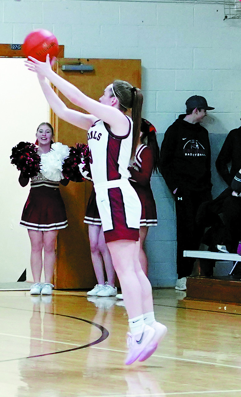 Meredith Romfo was Player of the Game against North Prairie in Munich on Jan 20. She nailed four 3-three point baskets and went four for four from the free throw line. Photo by Larry Stokke.