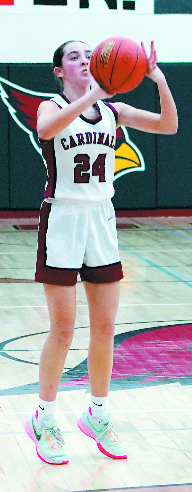Avery Lorenz drops in a 3-point bucket on Jan. 18 in Langdon during the win over MPCG. Photo by Larry Stokke.