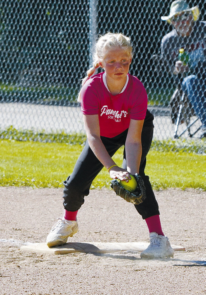 Sawyer Moline with a great catch at first base. Photo by Larry Stokke.