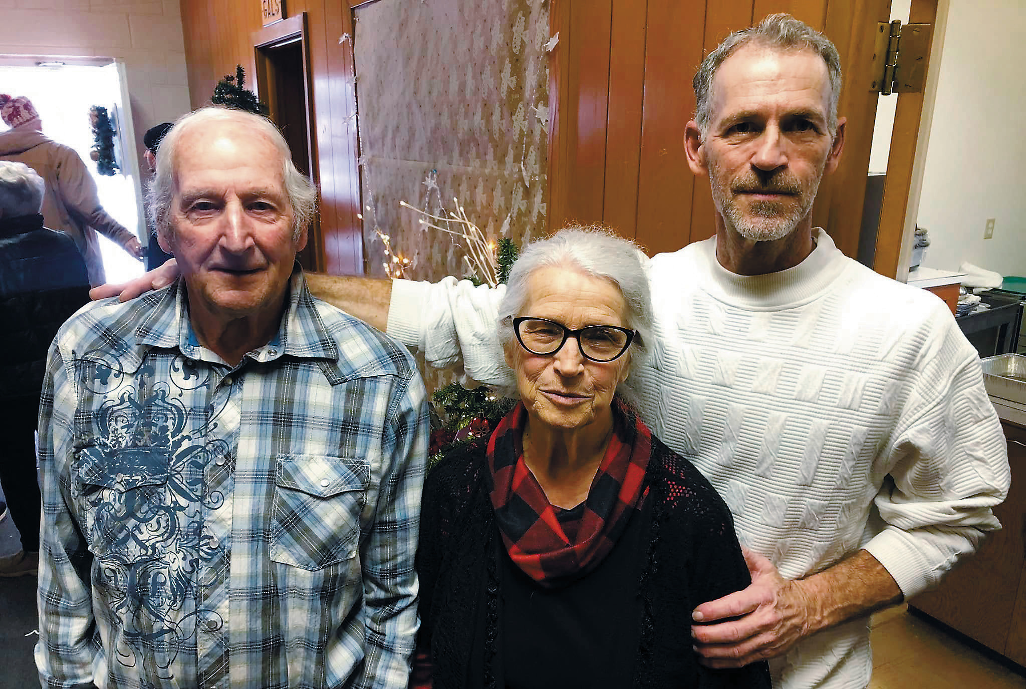 Joe, Amy, and Dale Phillips at a previous Walhalla’s Annual Christmas Dinner. Photo by Melanie Thornberg.