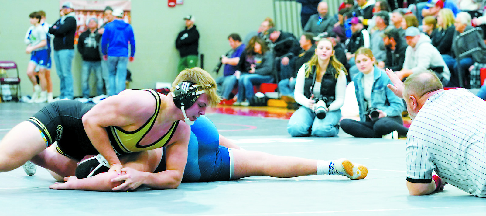Kayden Rose in the 215 lb. weight class pins his Northern Lights opponent in Carrington on Feb. 8. Photo by Larry Stokke.