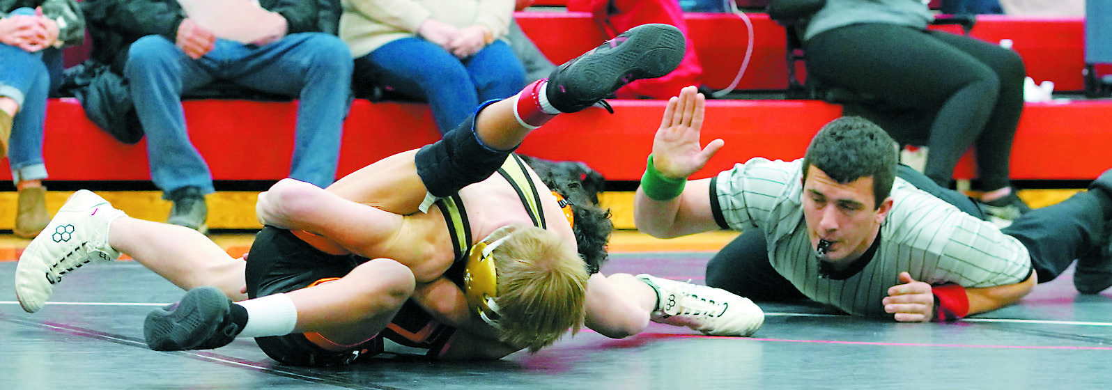 Henry Kemnitz pinned his Rugby opponent in Carrington on Feb. 8. Photo by Larry Stokke.