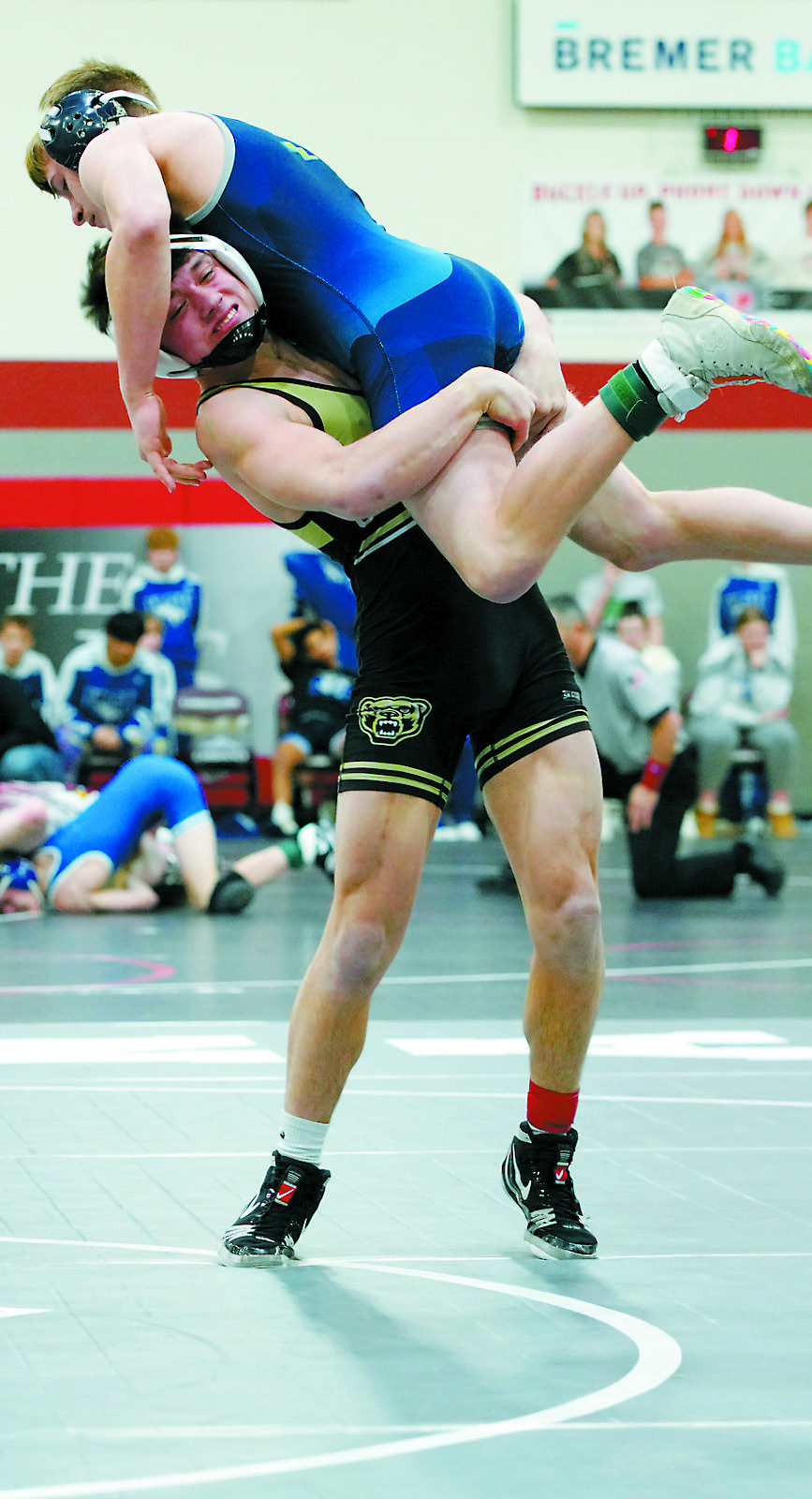 Logan Werner takes his Northern Lights opponent off his feet, pinning him in only 44 seconds. Photo by Larry Stokke.