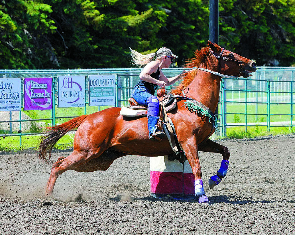 Cyndi Hummel and her mare, BLR Balto, placed 4th in the 2D Division in Grand Forks on June 8. Hummel is a mother of two and grandmother of one. She resides in Mountain, N.D. Photo by Larry Stokke.