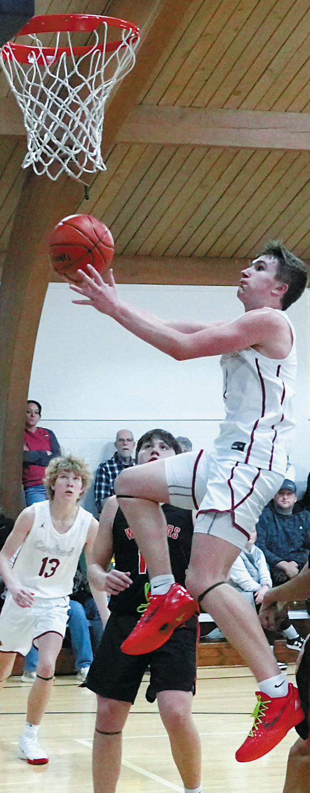 Eastyn Schaefer scored 21 points in the Cards win over Warwick in Munich Dec. 16. Photo by Larry Stokke.