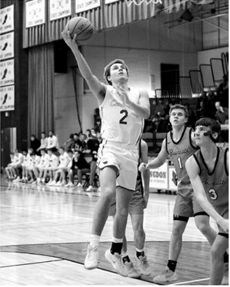 Senior Tanner McDonald added eight points to the Cards win over the Bearcats. Photo by Larry Stokke