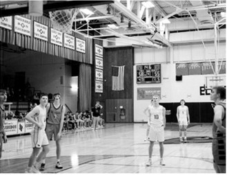 Maddux Stremick makes a freethrow with 14.6 seconds left on the clock. Photo by Larry Stokke