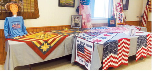 Several Quilts of Valor and informational displays were showcased during a recent ceremony hosted by American Legion Post 98. The program honors veterans with handmade quilts as a tangible expression of gratitude from the community. Submitted photo