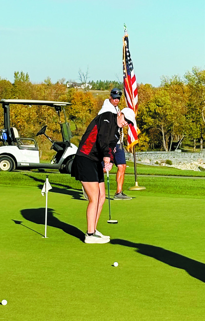 Nadia drops a shot in the cup at the state tournament. Photo courtesy of Jenny Romfo.