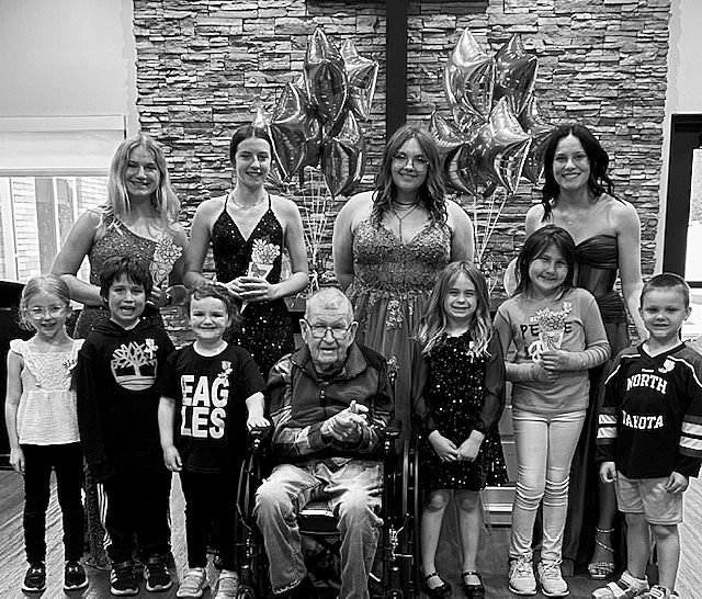 PNC resident Pete had his photo taken with students during prom.