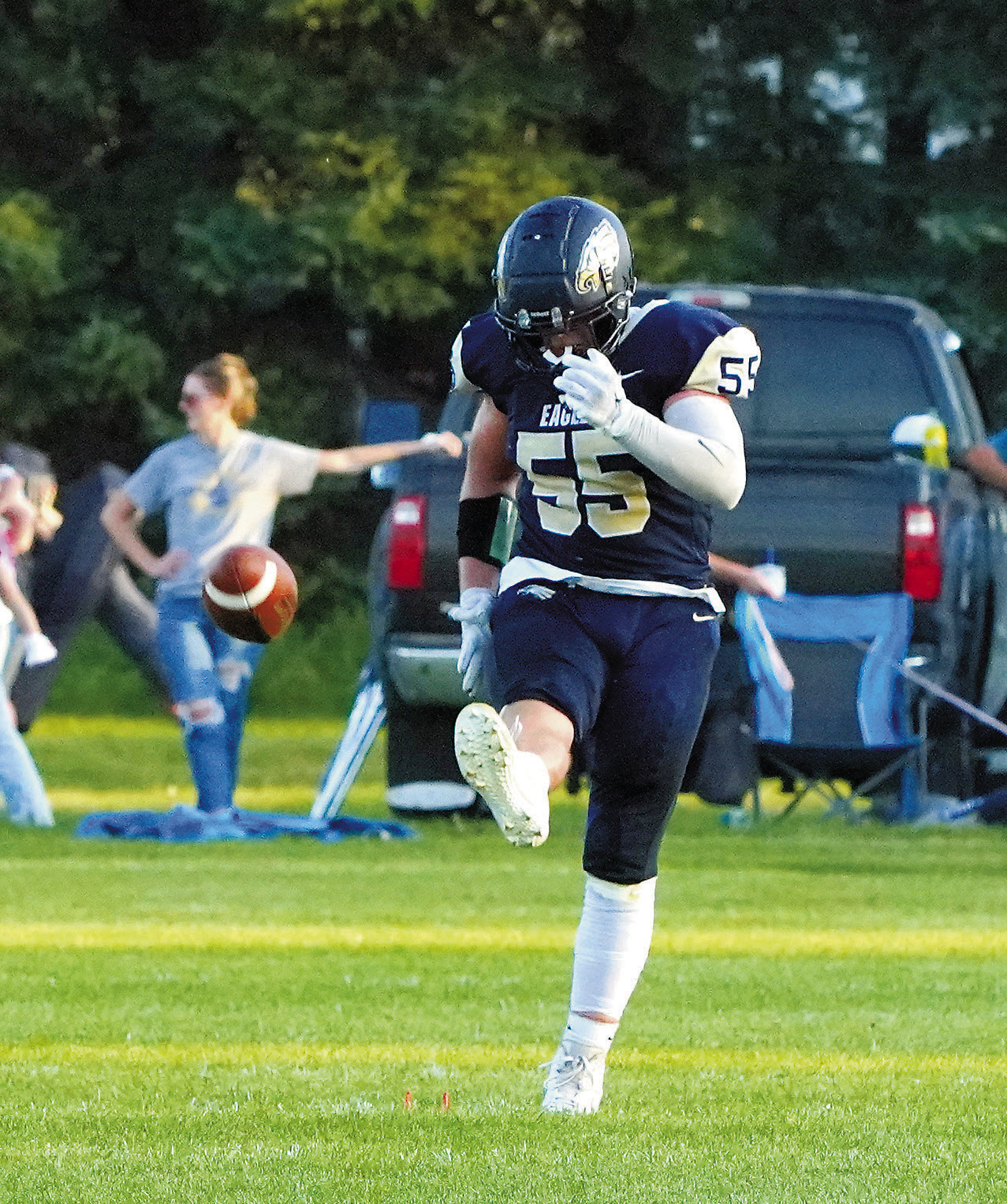 Gavin Symington kicks to the receiving Indians in Walhalla on Aug. 29. Photo by Larry Stokke.