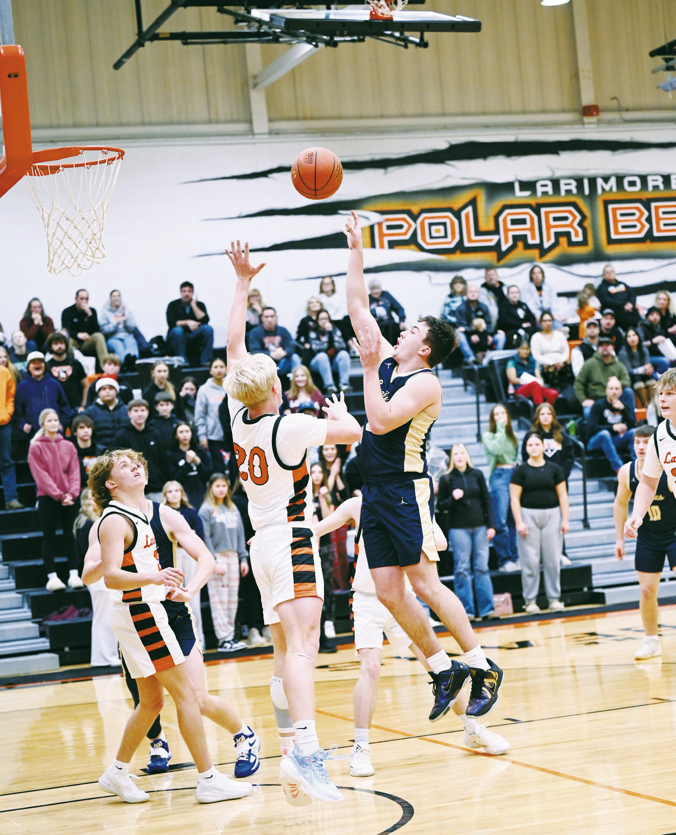 Brody Berg goes up for a shot in the game against Larimore. Photo by Ashley Schafer.