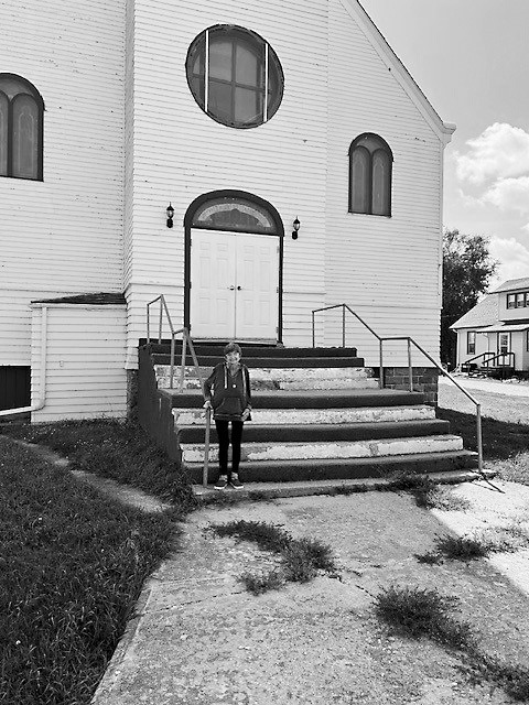 An up close photo of Rose at the Our Lady of the Sacred Heart Church in Olga.
