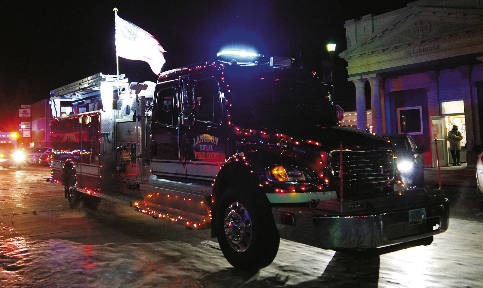 The shiny red truck of Langdon Fire Dept earned third place in the parade. Photo by Larry Stokke.