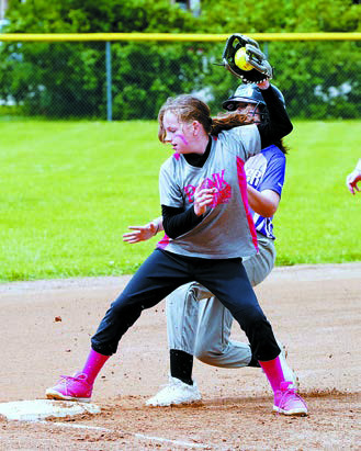 Parker Domres with a great catch outs a Cavalier player. Photo by Larry Stokke.