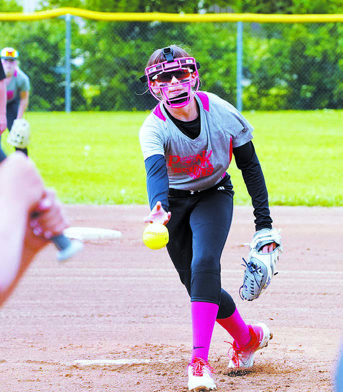 Lily Zimmer delivers a strike against Cavalier. Photo by Larry Stokke.