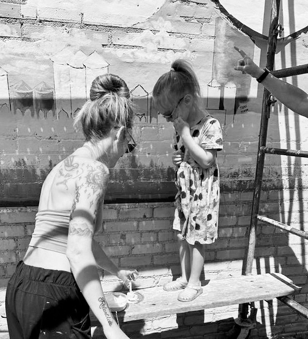 Getting our sponge ready with white paint.