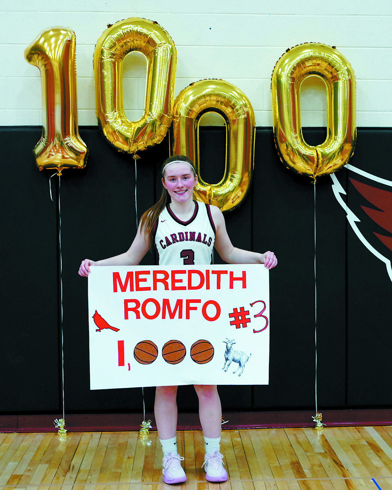 Meredith Romfo scored her 1,000th career point at Tuesday night’s game. Photo by Larry Stokke.