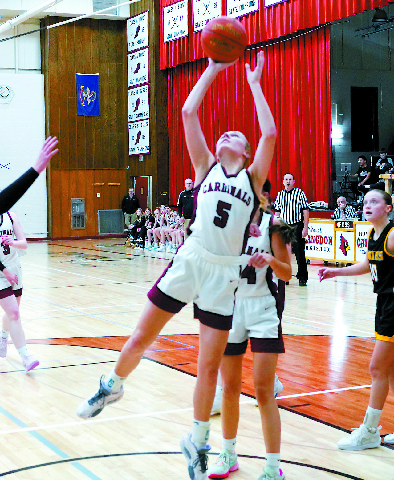 Kemi Morstad puts up a shot in the lane for two points in the win over the Aggies. Photo by Larry Stokke. Langdon-Munich 57, Park River-