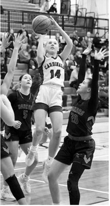 Hillary Haaven was the FM Bank Player of the Game against Kenmare/Bowbells on Saturday, Feb. 7 in the last home game in Langdon. She finished the game with five 3-point baskets and had 21 points for the game. Photo by Larry Stokke