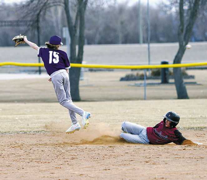 Connor Mitzel reaches 2nd base with a great slide. Photo by Larry Stokke.
