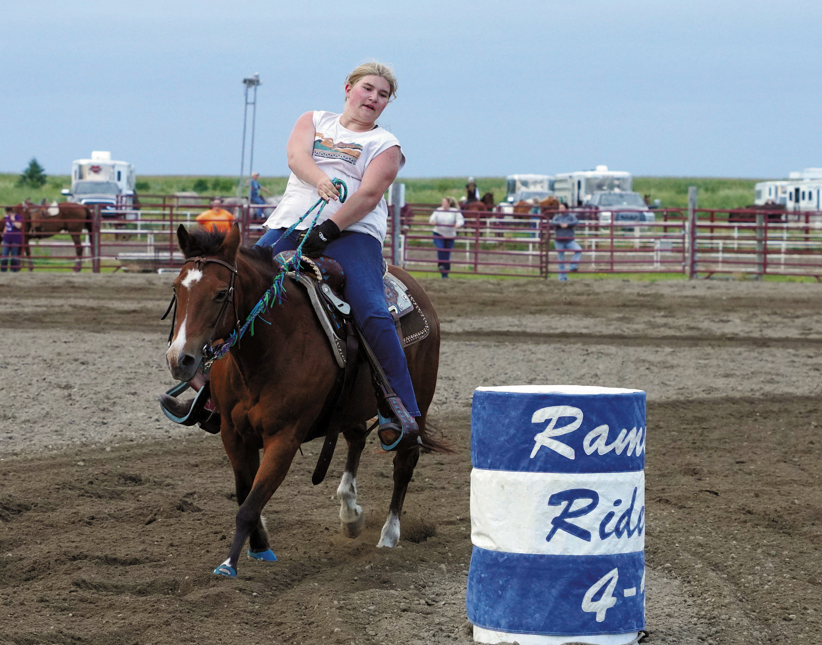 Cassidy Knoke rounds the third barrel on Pickles in the second open in Devils Lake on Aug. 6. Photo by Larry Stokke.