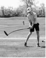 Porter Pritchard of Langdon Area/Munich launches a tee shot during regional action. Photo by Larry Stokke