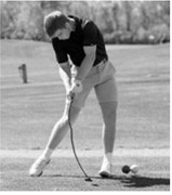 North Border golfer Zeke Symington takes a swing during regional tournament action. Photo by Larry Stokke