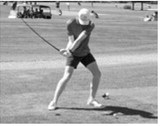 North Border golfer Bjorn Evenson swings through a shot during regional competition. Evenson qualified for the state tournament with a strong performance for the Eagles. Photo by Larry Stokke