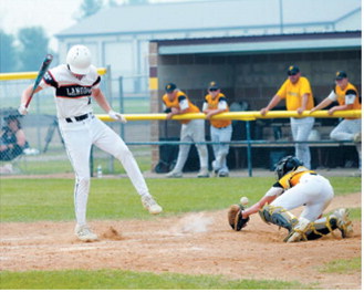 Austin Wenzel avoids a wild pitch during Langdon's District 3 tournament game against Park River in Grafton on July 16. Photo by Larry Stokke