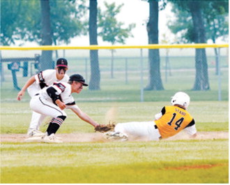 Bensen Fetsch applies the tag at second base to record an out during the Babe Ruth tournament game against Park River in Grafton on July 16. Photo by Larry Stokke