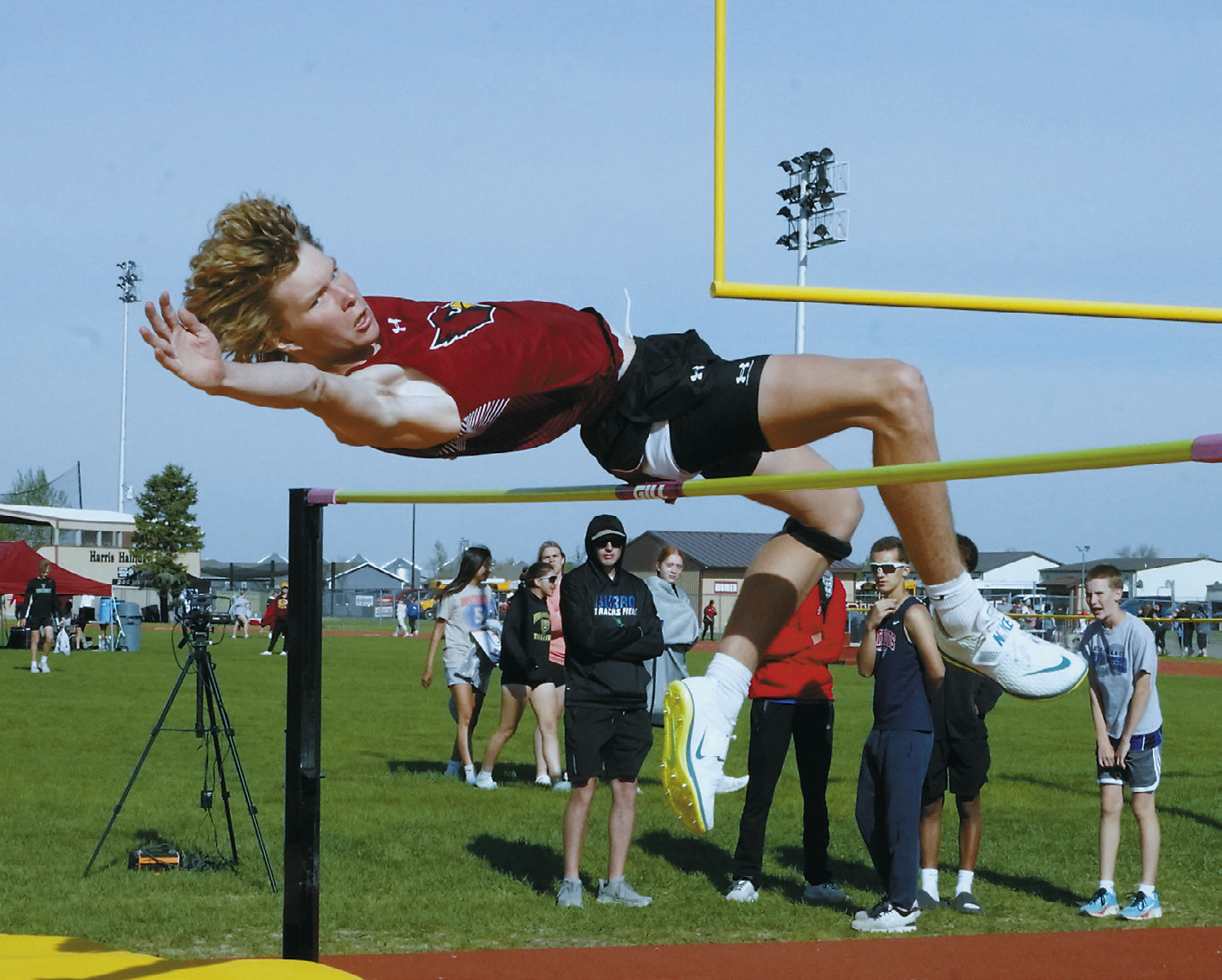 Caleb McDonald placed 4th in the high jump, clearing the bar at 5' 10'. Photo by Larry Stokke.