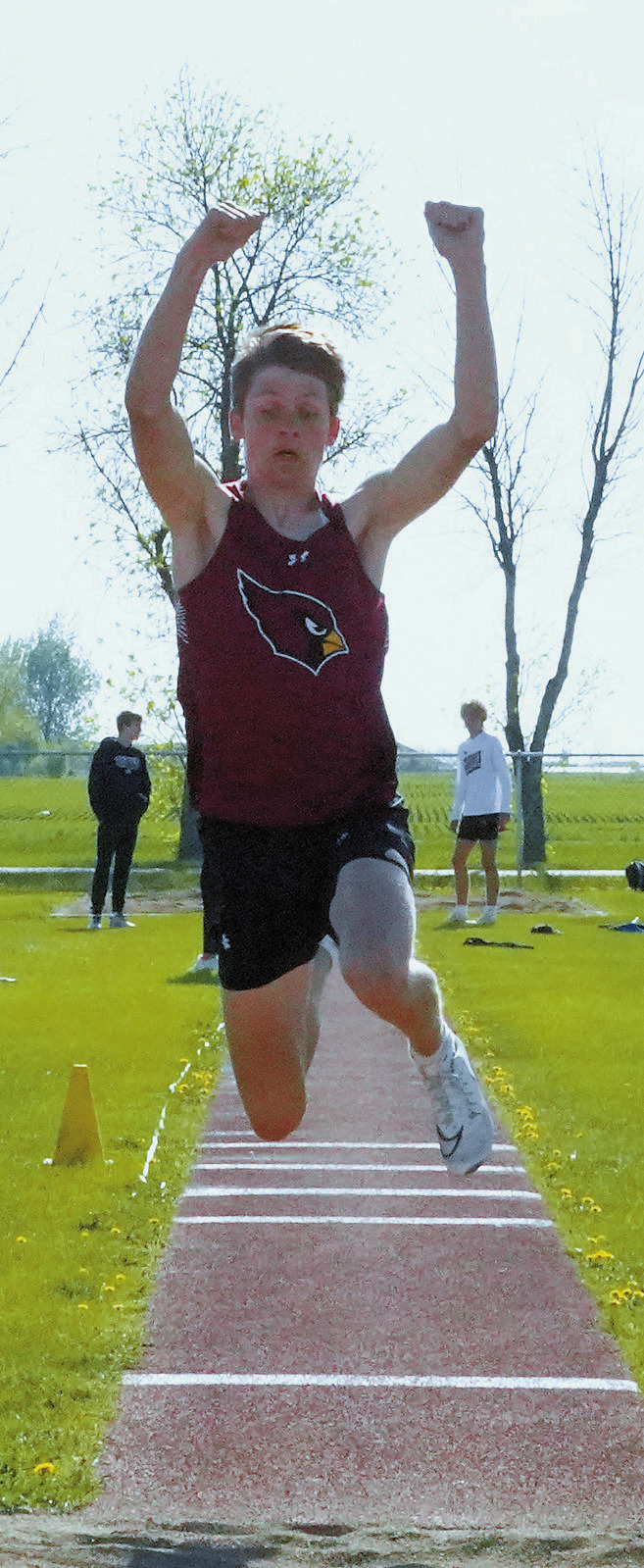 T J Henderson qualified for state in both the long jump and triple jump. Photo by Larry Stokke.