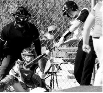 James Stevenson connects for a base hit. Photo by Larry Stokke