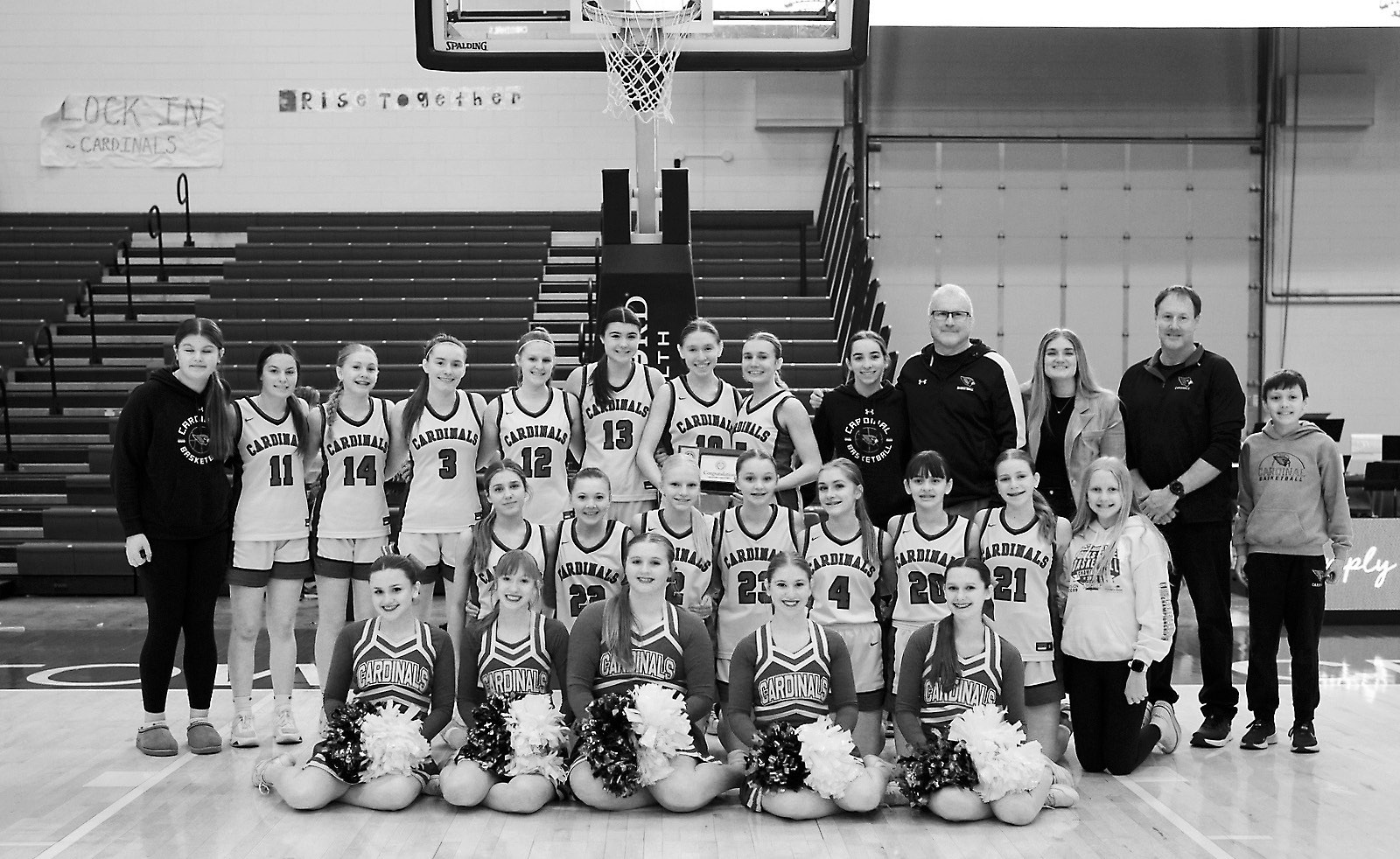 The Lady Cardinals 5th place team photo. Photo by Larry Stokke.