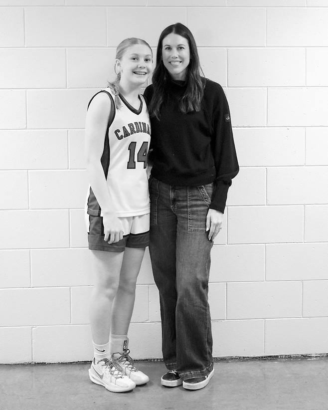 Hilary Haaven and her aunt, Lindsay (Haaven) Gust celebrated after the game with both of them now having played in state tournaments. Photo by Larry Stokke.