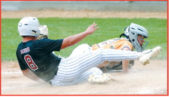 Dawson Downs slides home to score for the Red Sox against Grafton on Monday, July 20. Photo by Larry Stokke.