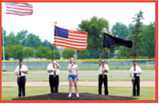 Finley Crockett sings the national anthem during the American Legion baseball tournament in Langdon. Crockett performed both days of the tournament. Photo by Larry Stokke