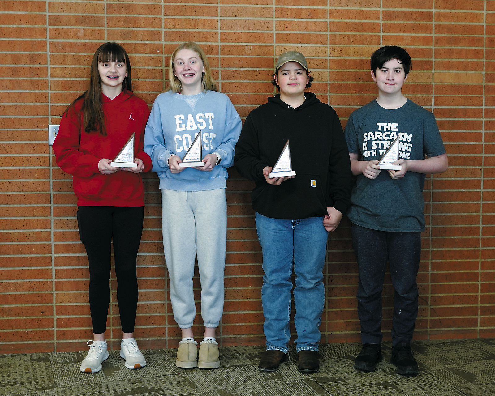 1st place team at MathCounts from Munich (L-R) Lily Zimmer, Hilary Haaven, Brett Brown, Gabriel Woodrow. Photo by Larry Stokke.