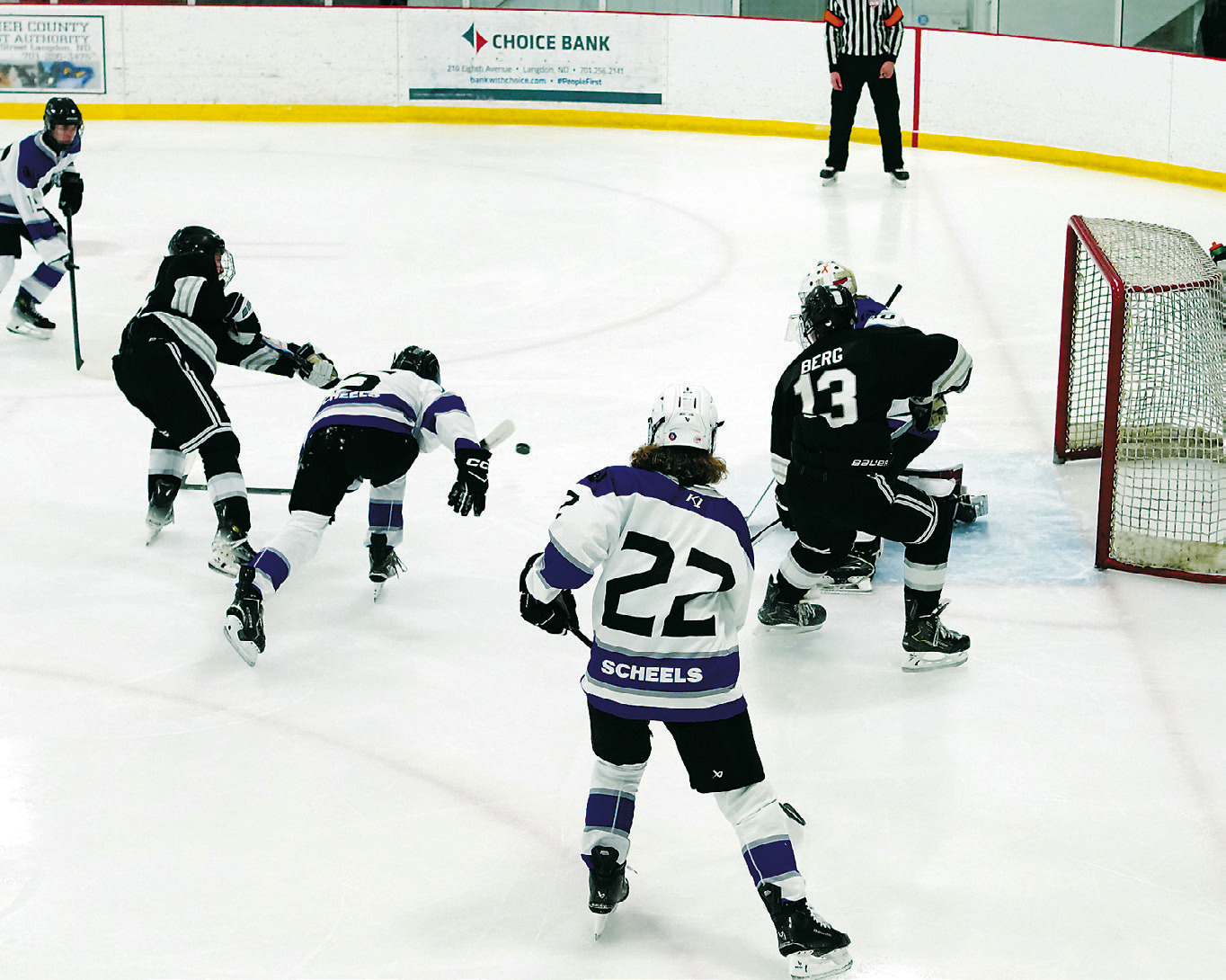 Tucker Gellner shoots the puck past the Fargo goalie to score the winning overtime goal. Photo by Jake Kulland.