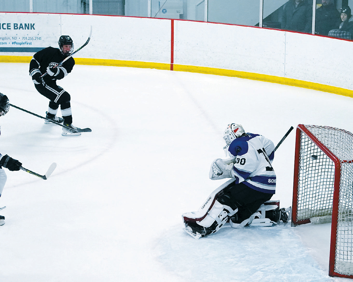 Ty Ramberg scoring one of his three goals for a hat trick in the Blades overtime win over Fargo. Photo by Larry Stokke.