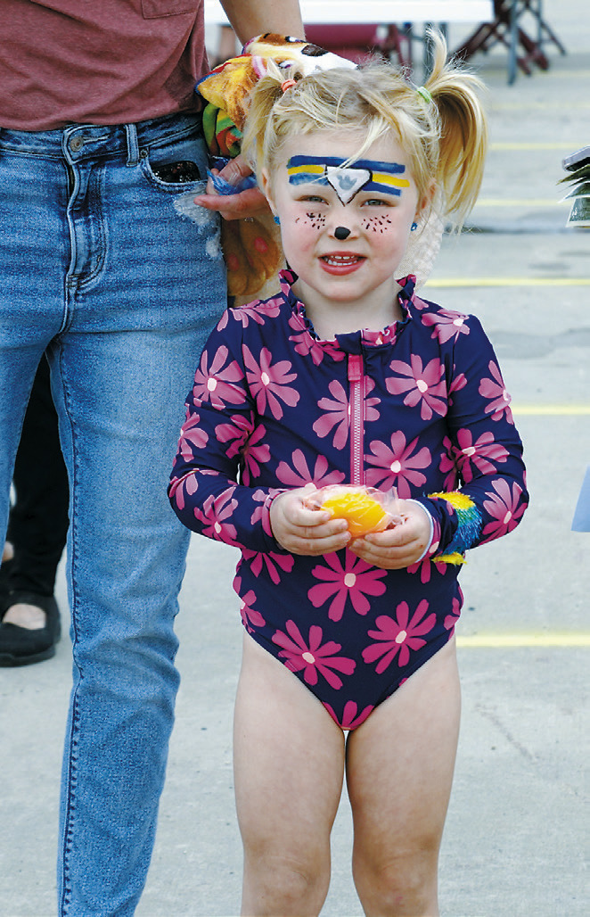 Kids enjoyed face painting as one of the activities offered at the event. Photo by Larry Stokke.