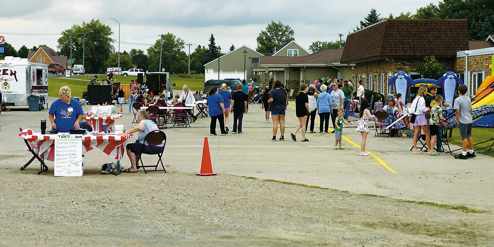 Live music, good food, and fun games were all a part of the Maple Manor Carnival hosted on Aug. 14. Photo by Larry Stokke.